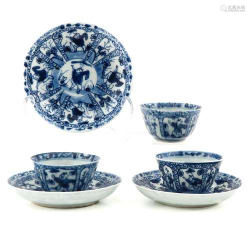 A Set of 3 Blue and White Cups and Saucers