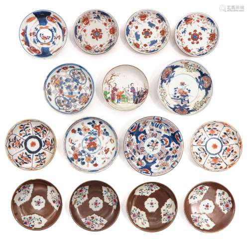 A Collection of 15 Saucers