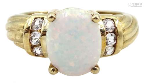 9ct gold single stone opal ring with white topaz shoulders