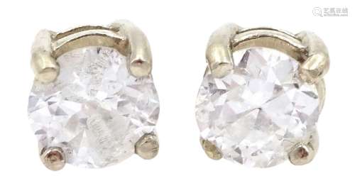 Pair of 18ct gold round diamond stud earrings