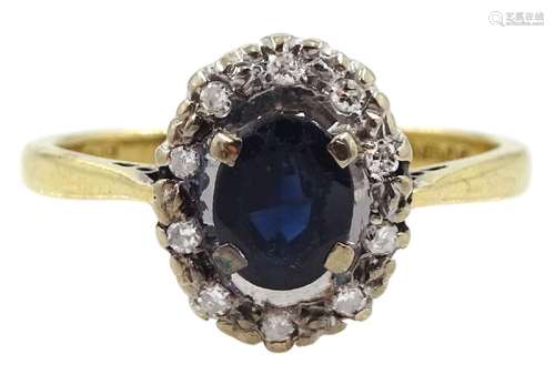 18ct gold oval sapphire and diamond cluster ring