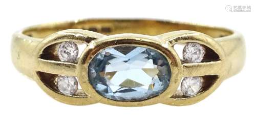 9ct gold blue topaz and cubic zirconia ring