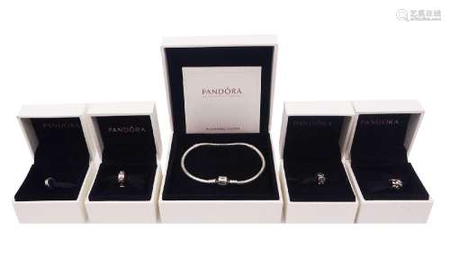 Silver Pandora bracelet and four silver Pandora charms