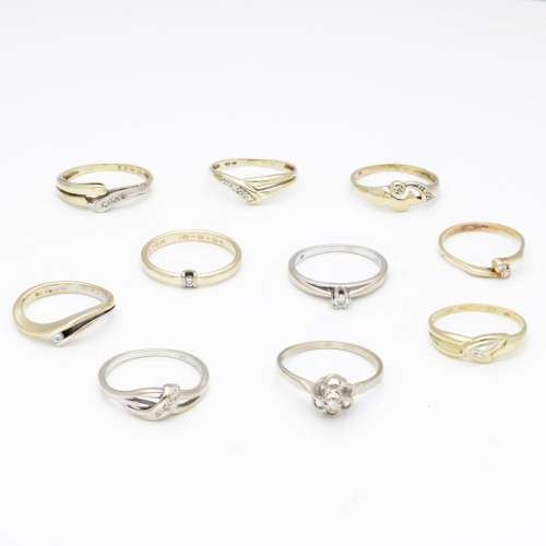 Lot of 14K. gold rings, some of which are set with diamonds.