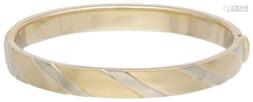 14K. Bicolor gold bangle bracelet.