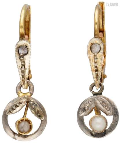 18K. Bicolor gold antique earrings each set with a diamond a...