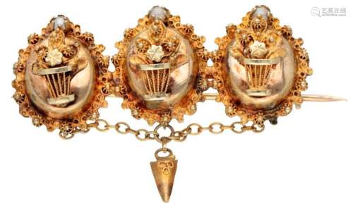 Antique 14K. yellow gold brooch set with seed pearls.