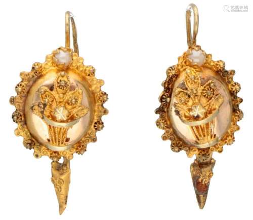 Antique 14K. yellow gold earrings set with a pearl.