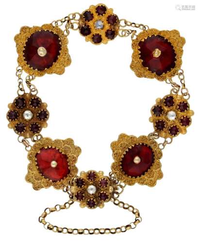 Antique 14K. yellow gold bracelet set with garnet and rhines...