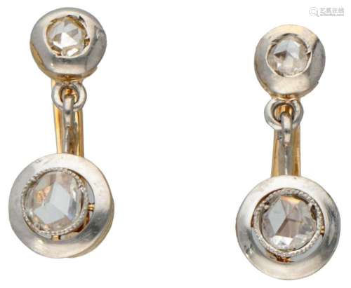 14K. Bicolor gold earrings set with diamonds.
