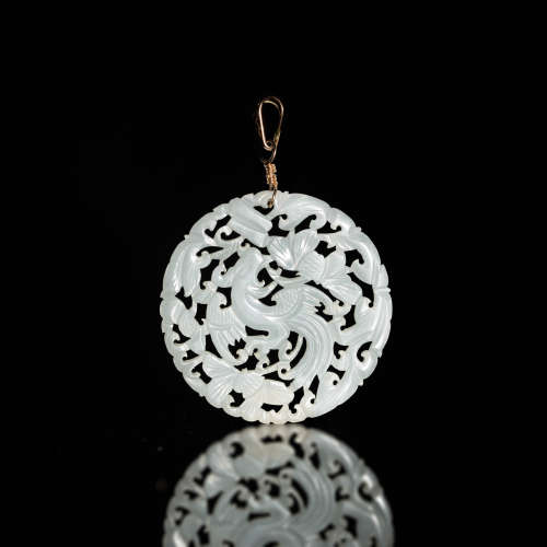 十九世紀 白玉鏤雕鳳凰圓佩A Chinese white jade pierced carved...