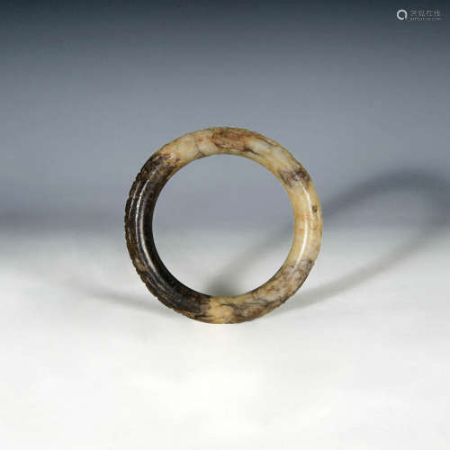 明代 玉雕篆文手鐲A Chinese jade bangle carved with old chara...