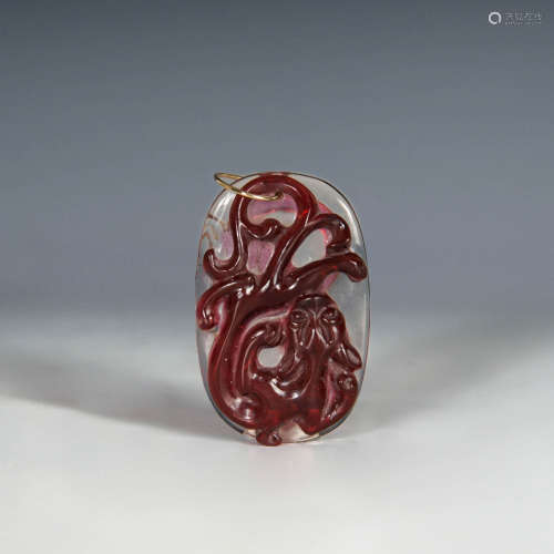 十八世紀 白地套紅料器雕螭龍佩A Peking glass pendant carved w...