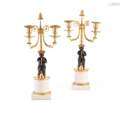 PAIR OF REGENCY GILT AND PATINATED BRONZE FIGURAL CANDELABRA...