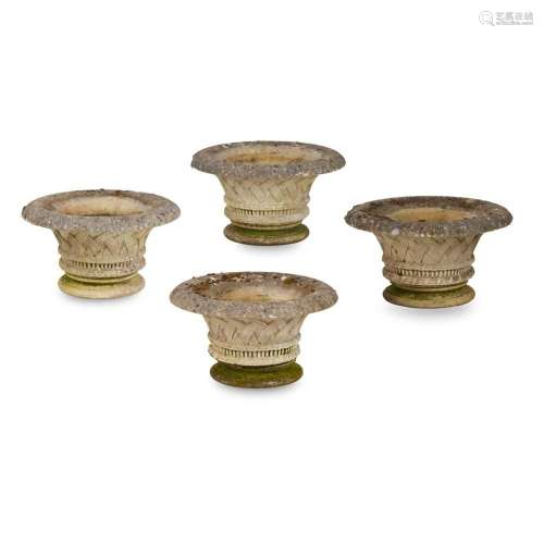 SET OF FOUR LARGE COMPOSITION STONE URNS 20TH CENTURY