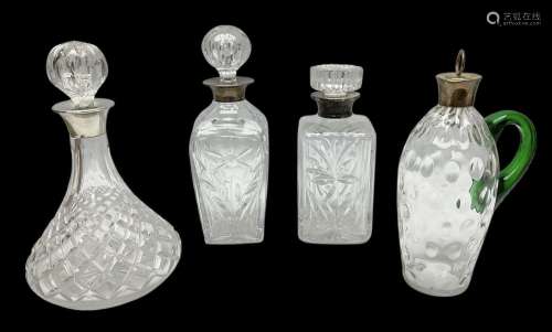 Four silver mounted decanters