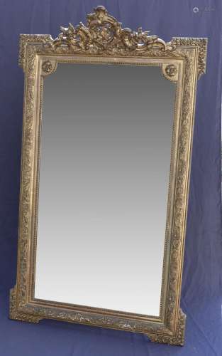 Grand miroir en bois et stuc doré