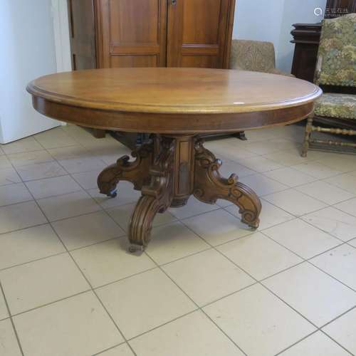 Table ovale en bois naturel  moulu