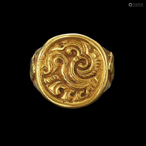. A gold repoussé ring with spirals Java, Indonesia, 7th-12t...