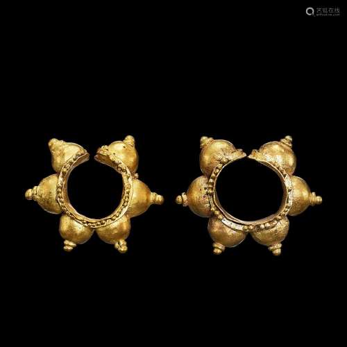 . A pair of studded ball gold earrings Java, Indonesia, 7th ...