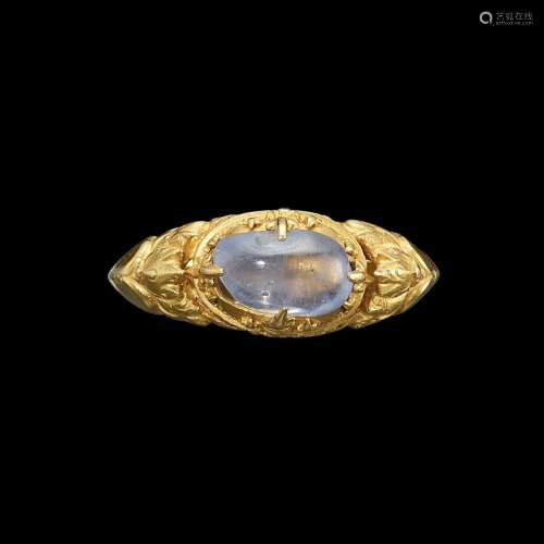 . A solid gold and sapphire ring Central Java, Indonesia, 9t...