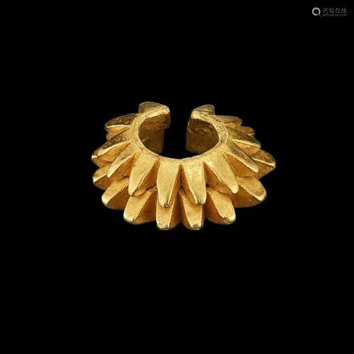 . A double-layered solid gold earring Java, Indonesia, 7th -...