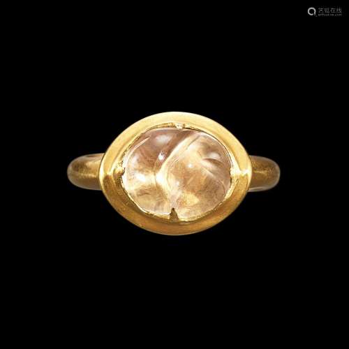 . A solid gold and crystal pebble ring Java, Indonesia, 7th ...