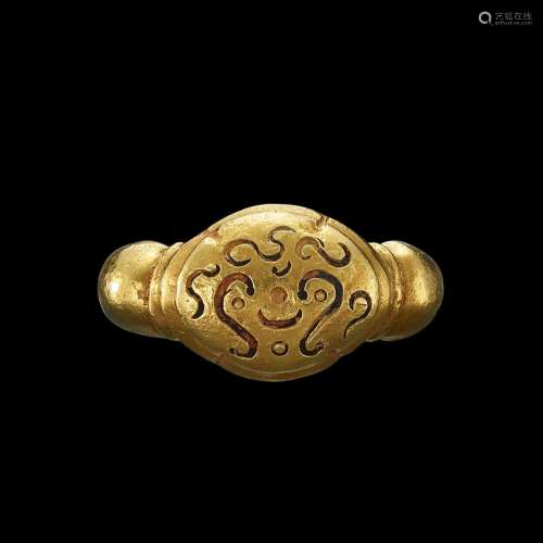 . A solid gold ring with an incised bezel Java, Indonesia, 7...