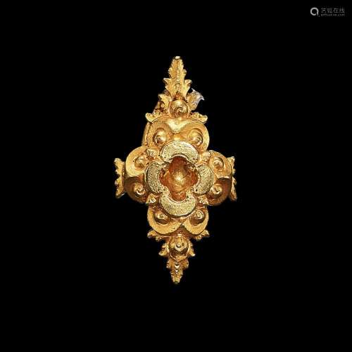 . An elaborate solid gold earring Java, Indonesia, 7th - 12t...