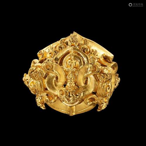 . An elaborate solid gold ribbon ornament Java, Indonesia, 7...
