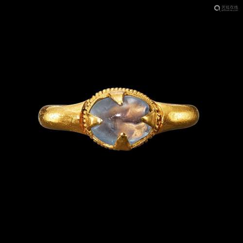 . A solid gold and sapphire ring Khmer, 7th - 12th century |...