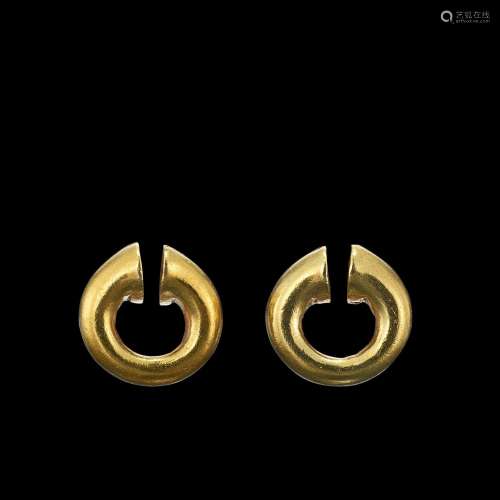 . A pair of solid gold earrings Java, Indonesia, 7th - 12th ...