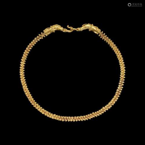. A solid gold necklace with cruciform terminals Khmer, 9th ...