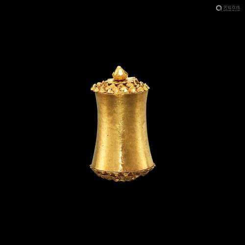 . Cylindrical ear ornament made of gold sheet with decorativ...