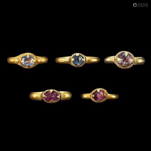 . A group of five solid gold rings Khmer, 7th - 12th century...