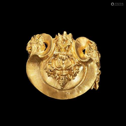 . An elaborate solid gold ribbon ornament Java, Indonesia, 7...