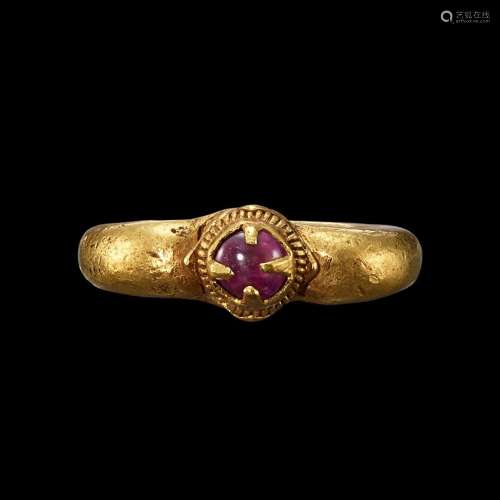 . A solid gold and pink sapphire ring Khmer, 7th - 12th cent...