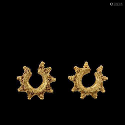 . A pair of granulated solid gold earrings Java, Indonesia, ...
