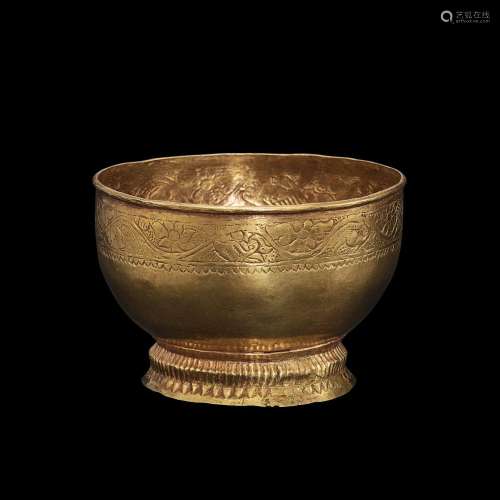 . A chiseled gold bowl with lotus flower and animals Khmer, ...