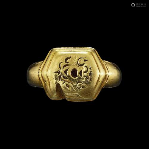 . A solid gold ring with hexagonal bezel of a flowerpot and ...