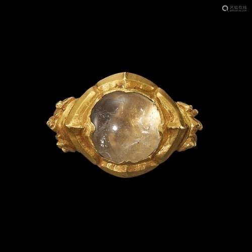 . A gold and crystal repoussé ring Java, Indonesia, 7th - 12...