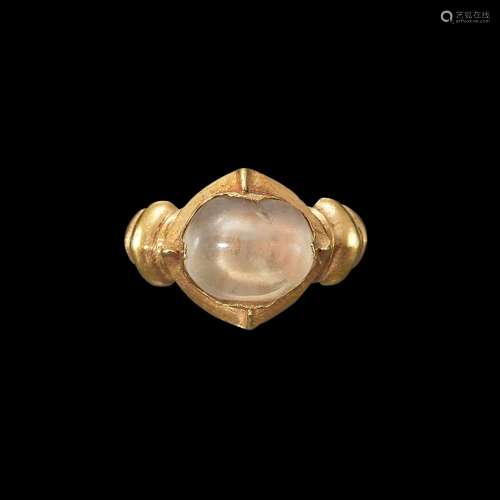 . A gold and crystal ring with ribbed shank Java, Indonesia,...