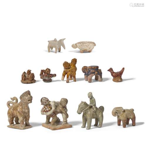A GROUP OF ELEVEN STONEWARE FIGURES  Thailand, 14th-16th cen...
