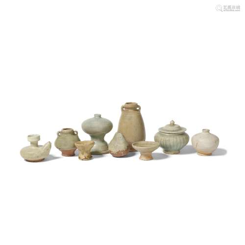 A GROUP OF NINE SMALL CELADON-GLAZED VESSELS Thailand, 14th-...