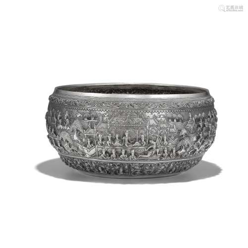 A SILVER OFFERING BOWL WITH SCENES FROM THE EARLY LIFE OF PR...