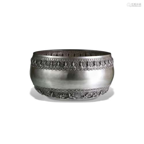 A SILVER OFFERING BOWL WITH RAMA, LAKSHMANA, AND MARICHA LOW...