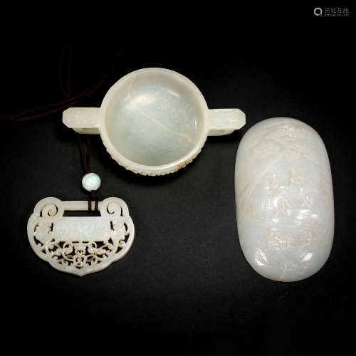 A GROUP OF CHINESE HETIAN JADE CUPS, ARM RESTS, AND BRAND, Q...