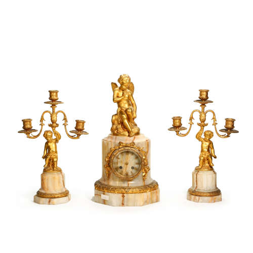 A SET OF FRENCH 19TH-CENTURY COPPER-FLOWING GOLD CLOCKS AND ...