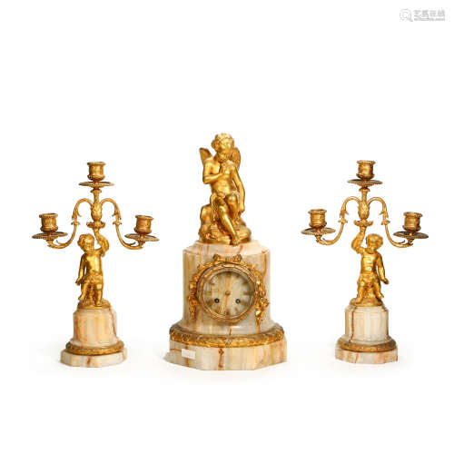 A SET OF FRENCH 19TH-CENTURY COPPER-FLOWING GOLD CLOCKS AND ...