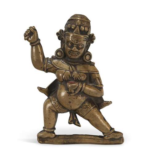 A BRONZE FIGURAL PLAQUE OF A WRATHFUL DEITY